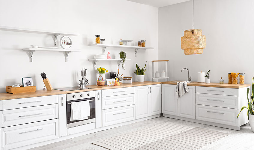 Modern kitchen with cool-toned white paint, showcasing minimalist design 